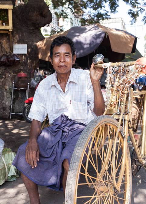 Scott Dietrich, Man with Gold Bike, Mandalay Market, Myanmar, 2014