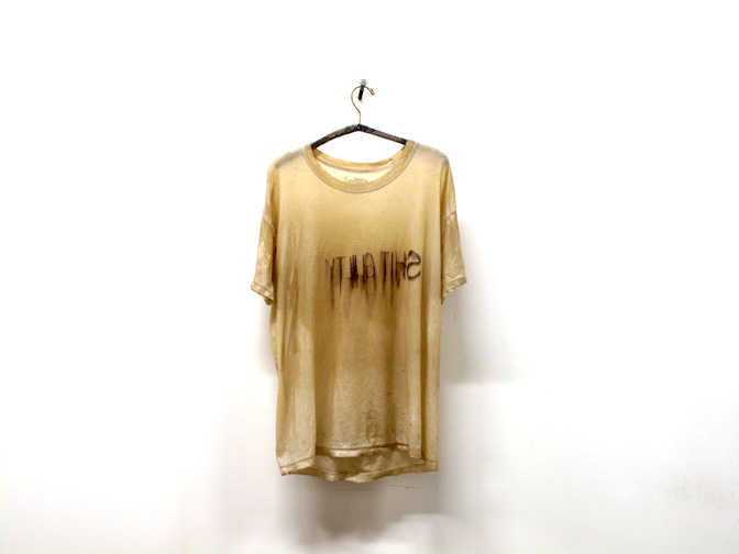 Alex Gartelmann, Shit Guilty, 2014 T-Shirt, epoxy, resin, wood, tape, brass, 21x36x6 inches