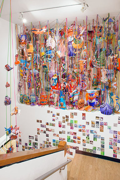 Aimée Beaubien MoCP at 40, Museum of Contemporary Photography, Chicago, IL Collecting Within, 2016 pigment prints, paracord, mason line, wooden dowels, miniature clothespins, party lights  dimensions variable