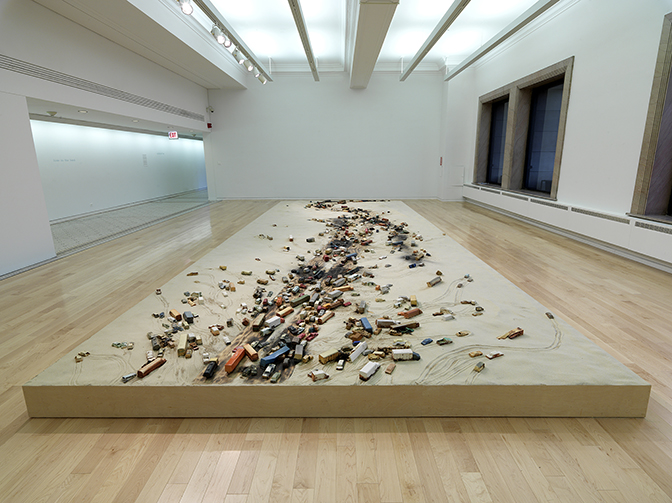 Alison Ruttan, “Line in the Sand”  (installation view), 2015  Slip Cast Ceramics, wood, burnt wood, sand, black sand 