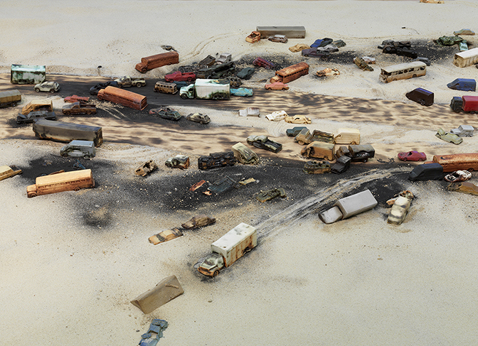 Alison Ruttan, “Line in the Sand”  (close up), 2015  Slip Cast Ceramics, wood, burnt wood, sand, black sand  