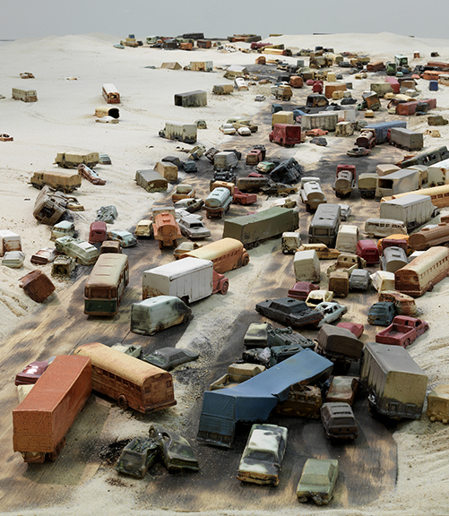 Alison Ruttan, “Line in the Sand”  (close up), 2015  Slip Cast Ceramics, wood, burnt wood, sand, black sand 