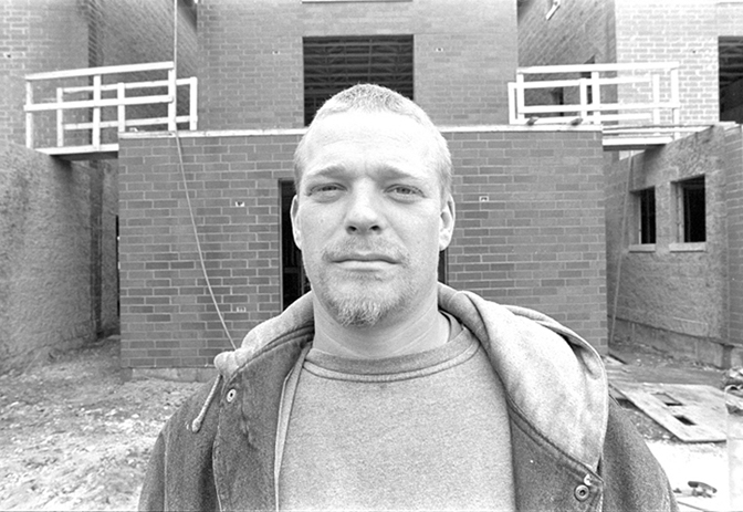 Jason Reblando, Phil Johnston, Brickwasher at new buildings on former site of Cabrini-Green, Chicago, 2002.