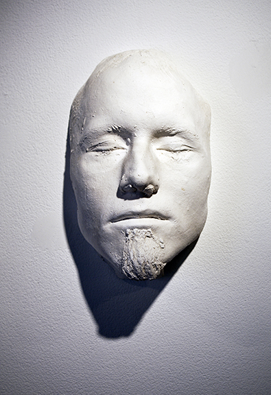 Colin Sherrell, Death Mask, plaster, installation view, University of St. Francis Art Gallery, Joliet, Illinois, 2018