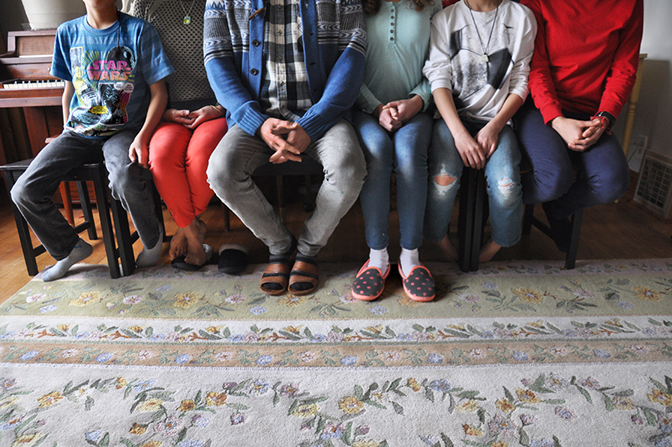 Alberto Aguilar with family, Chicago, IL, 2014 by Chester Alamo-Costello