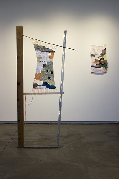 Allison L. Wade On left: Assume Non-Empty Domains, granite, wood, stain, metal, mason line, hand-dyed knit, knit, 75 x 36 x 4 inches, 2016 On right: Untitled (Wall Weaving #2), ceramic, hand-dyed knit, knit, 27 x 15 x 2 inches, 2016