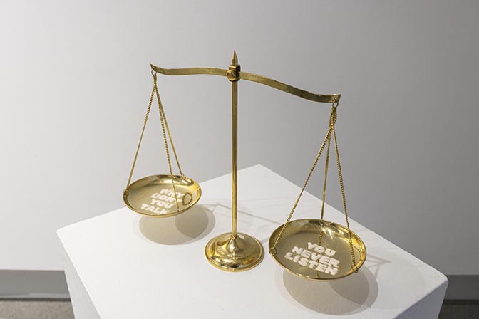 Ji Su Kwak, Balanced Talk, brass balance scale and sugar, 10.5 x 12.5 x 4.3”, 2019