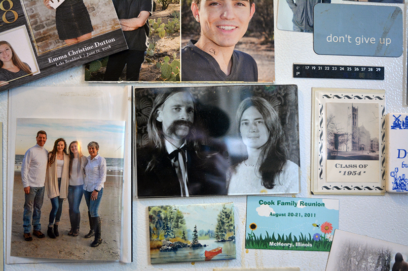 Photographs of the Cook-George family posted on refrigerator (BW photo is of Jno and Claudia on their wedding day), Ravenswood, Chicago, 2019