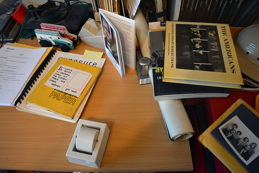 Photo papers, books and papers in Jno Cook's 2nd floor work space, Ravenswood, Chicago, 2019