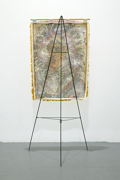 Jeffrey Grauel, hide (chief), latch hook kit, wool, wood dowel, funerary wreath easel, 52 x 24 x 20 inches, 2016